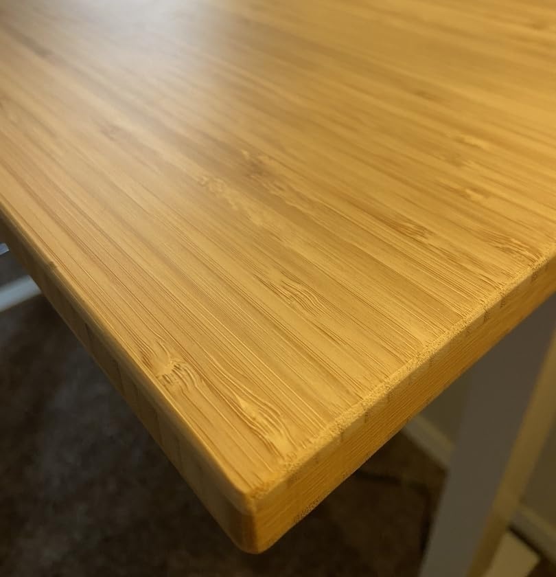 image:imageFLEXISPOT Solid Bamboo Standing Desk 48 x 24 Real Bamboo Desktop with Natural Grain Durable amp Sustainable Workstation for Home Office and MultiMonitor Setups Curved Black FrameWhite Oval Frame